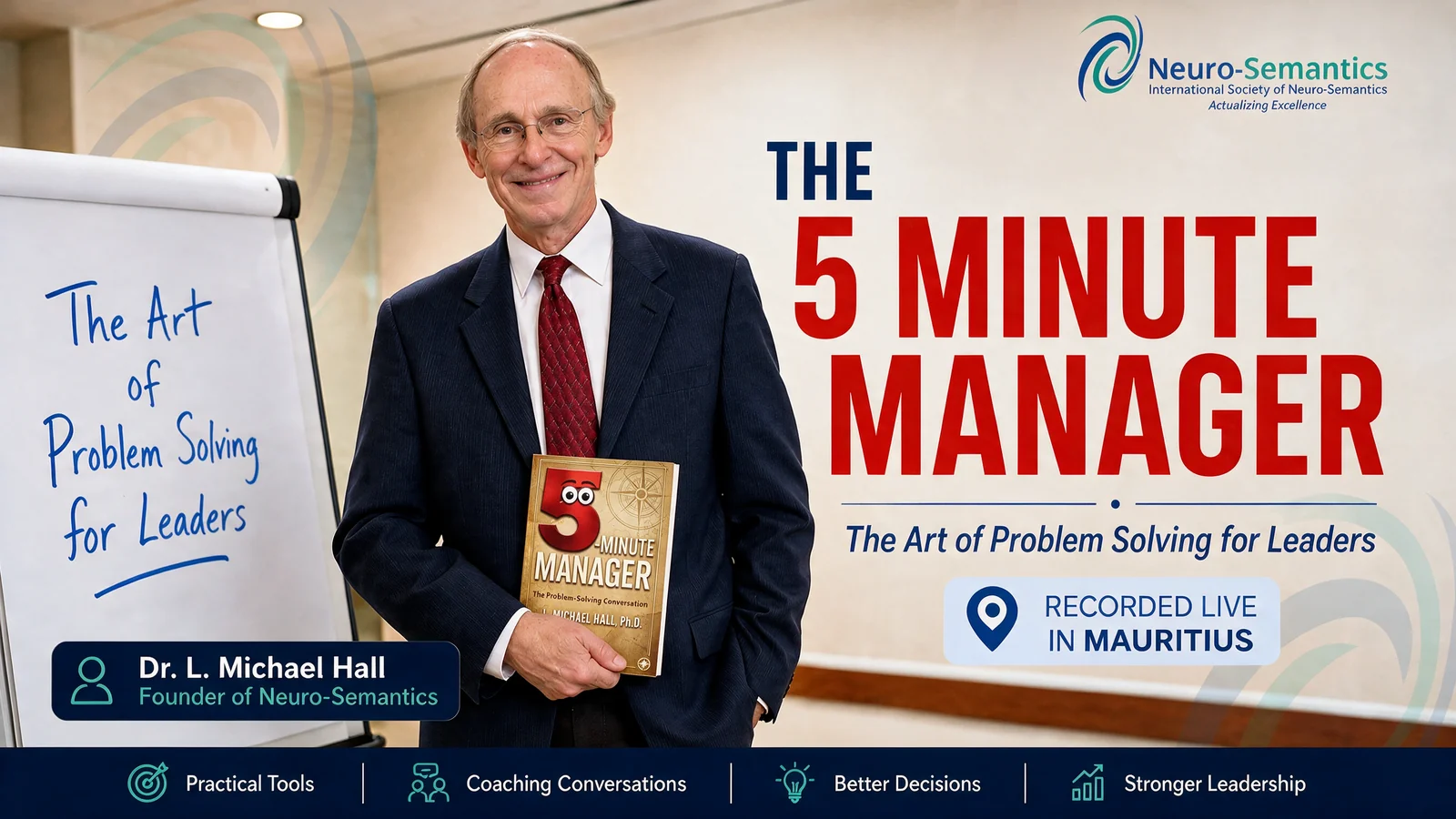 Dr. L. Michael Hall, Ph.D., holding The 5 Minute Manager โ recorded live in Mauritius